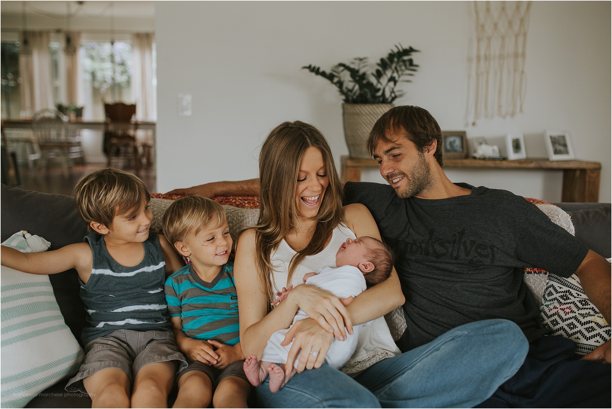 Family with newborn in an at home setting