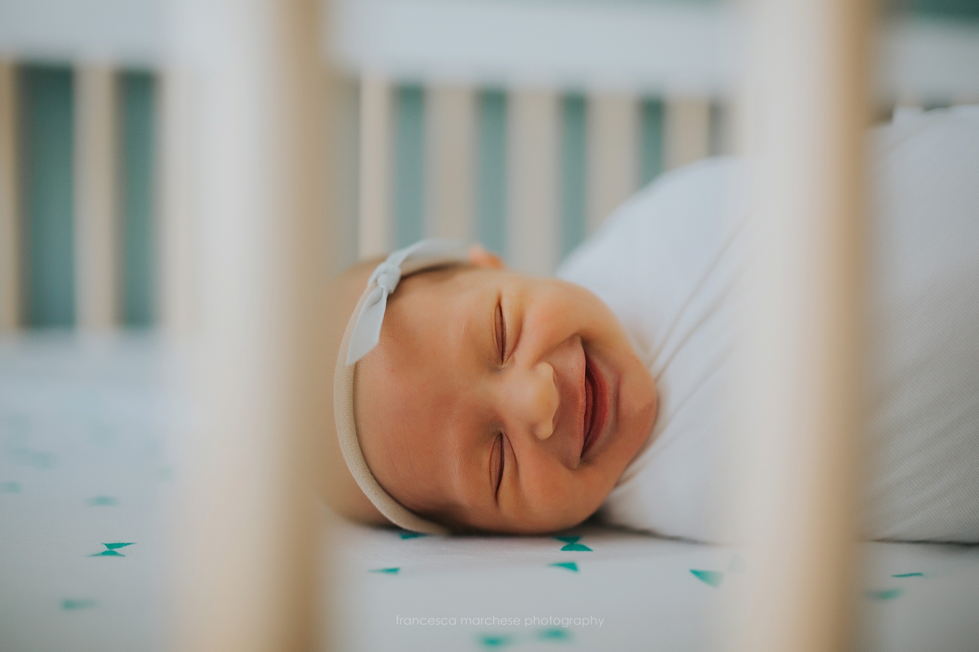Francesca Marchese Photography smiling newborn