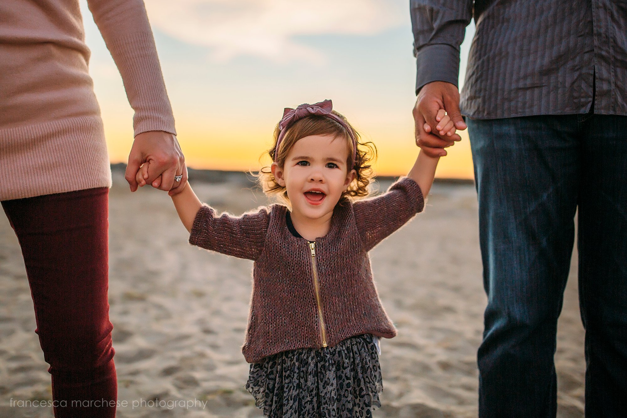 mom and dad holding childs hands - Francesca Marchese Photography Orange County Los Angeles Southern California Family Photographer